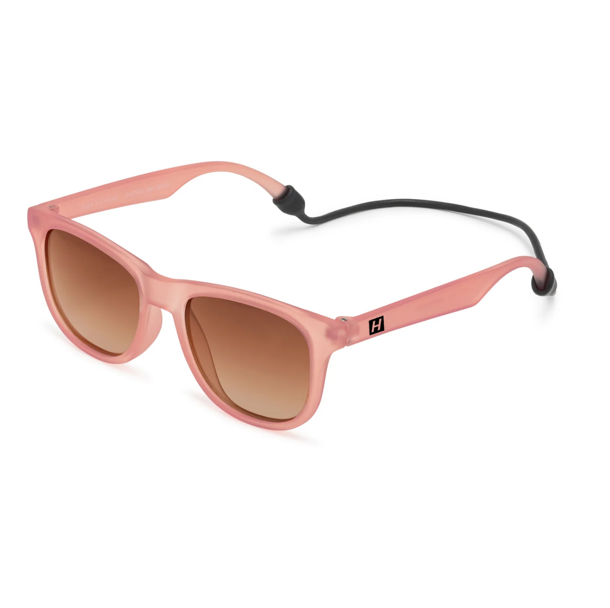 Pink sunglasses with brown lenses and a black stay-on strap, laying on a white background